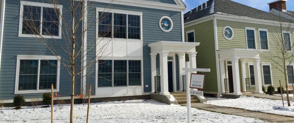 The newly-built, Colonial-style buildings feature large, sun-facing windows and covered private entrances.