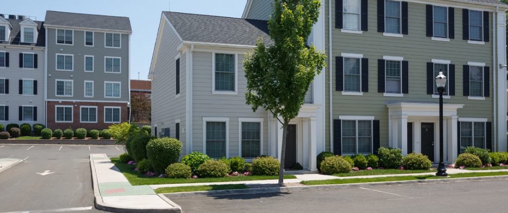 The new-looking buildings have plentiful windows and are surrounded by beautiful landscaping and easy parking.